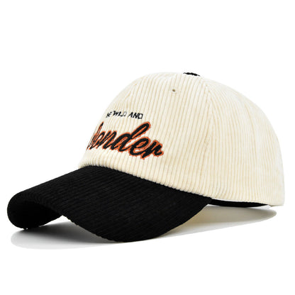 Black/White corduroy dome baseball cap with adjustable size and embroidered design for casual wear.
