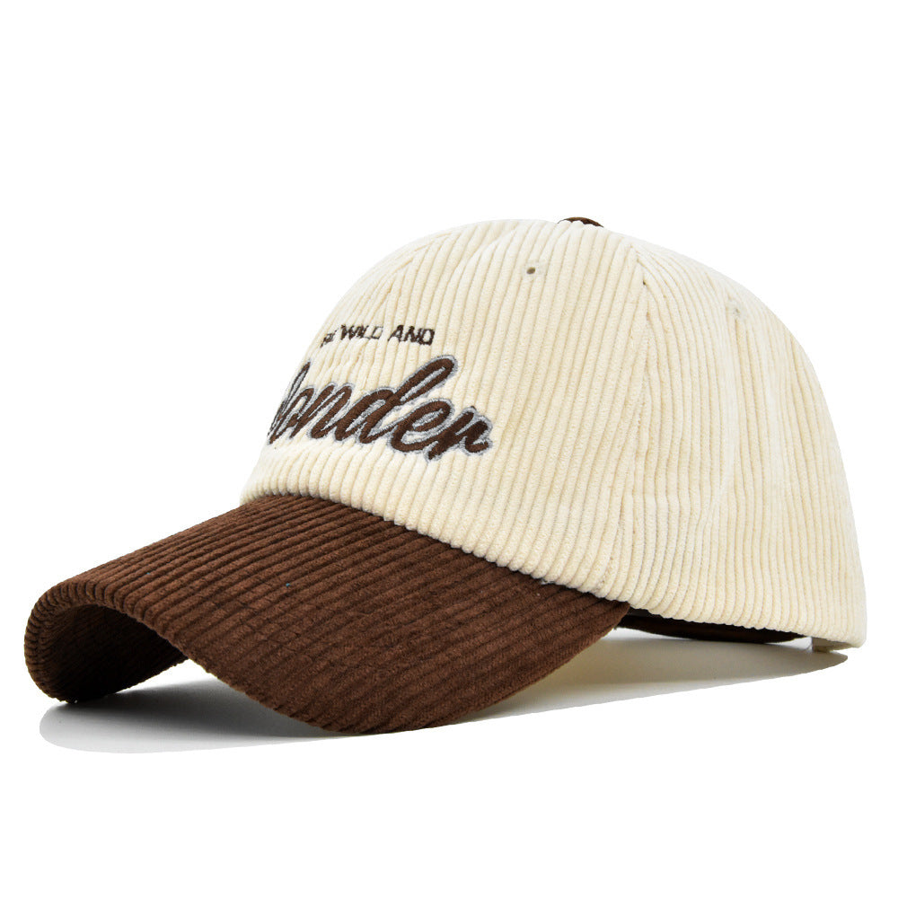 Coffee/White corduroy dome baseball cap with adjustable size and embroidered design for casual wear.
