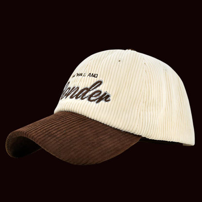 Coffee/White corduroy dome baseball cap with adjustable size and embroidered design for casual wear.
