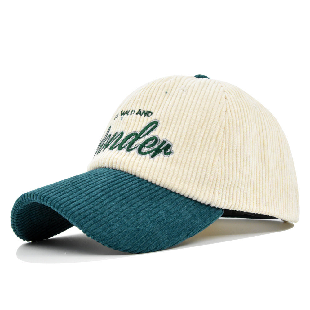 Green/White corduroy dome baseball cap with adjustable size and embroidered design for casual wear.
