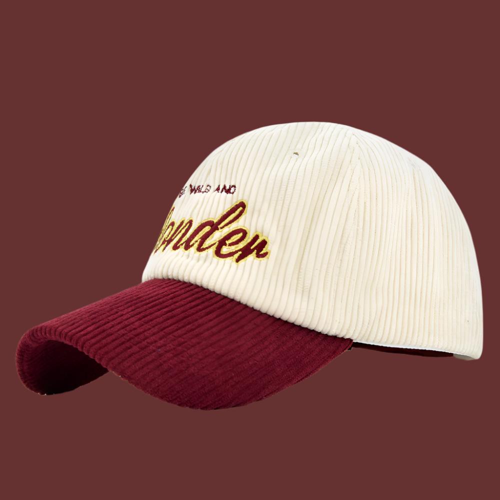 Wine/White corduroy dome baseball cap with adjustable size and embroidered design for casual wear.
